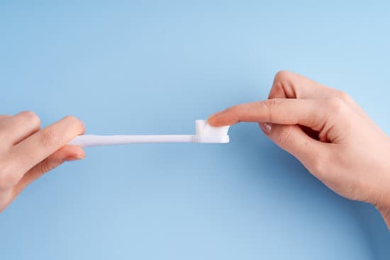 A-soft-bristled-toothbrush-with-blue-and-white-bristles-on-a-white-background.-Promotes-gentle-brushing-to-protect-tooth-enamel-and-gums-The-Alignify.jpg